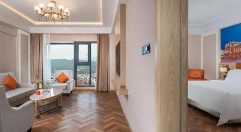 Bed in Vienna Hotel Shenzhen Longgang Baifucheng