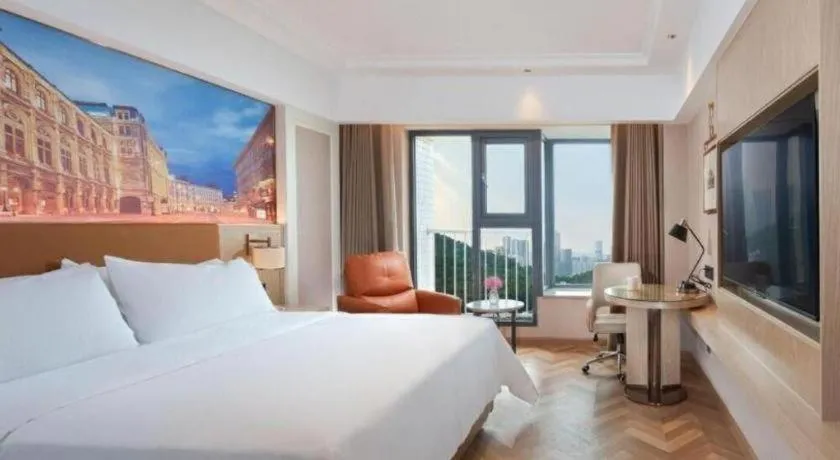 Bed in Vienna Hotel Shenzhen Longgang Baifucheng