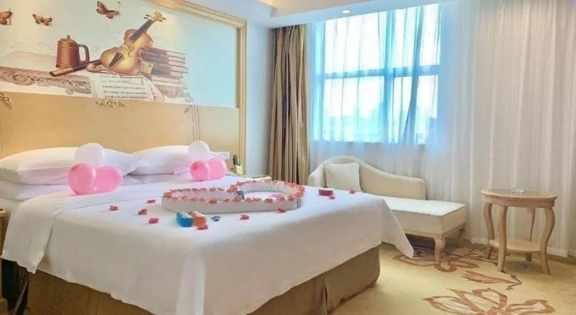 Bed in Vienna Hotel Shenzhen Longgang Baifucheng