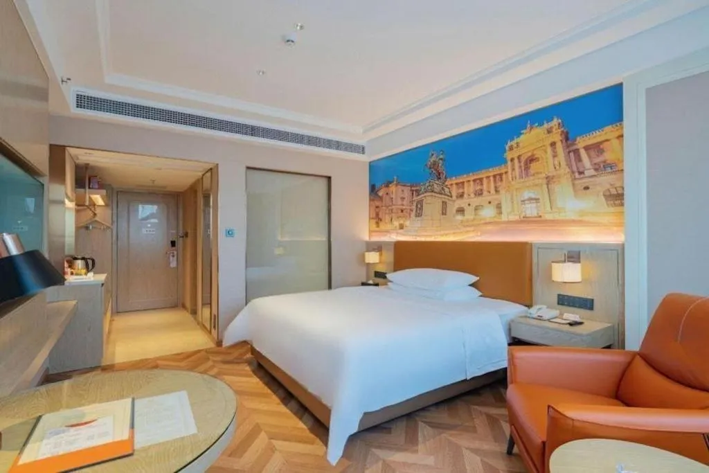 Bed in Vienna Hotel Shenzhen Longgang Baifucheng