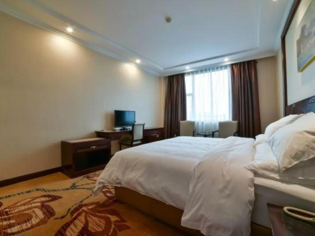 Bed in Vienna Classic Hotel Zhangzhou Longchi Center