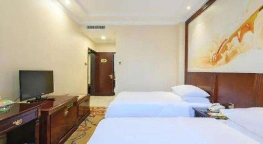 Bed in Vienna Classic Hotel Zhangzhou Longchi Center