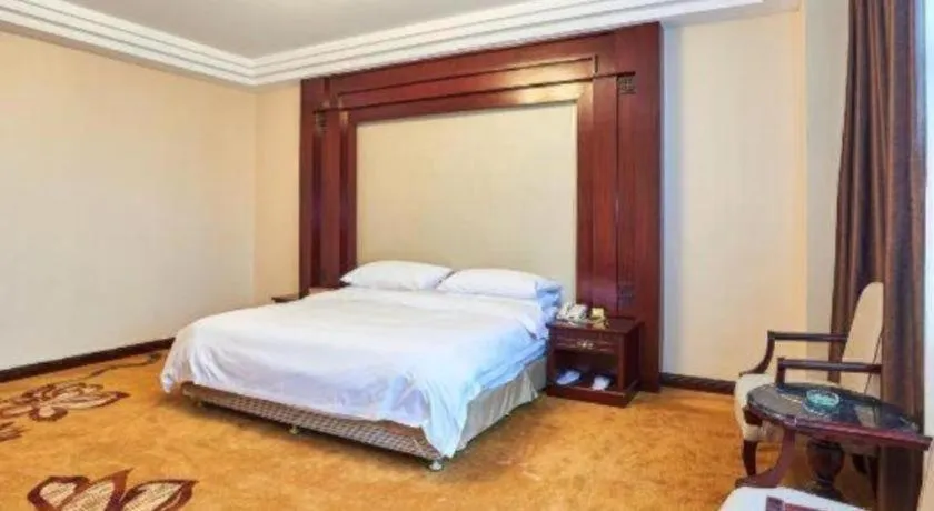 Bed in Vienna Classic Hotel Zhangzhou Longchi Center