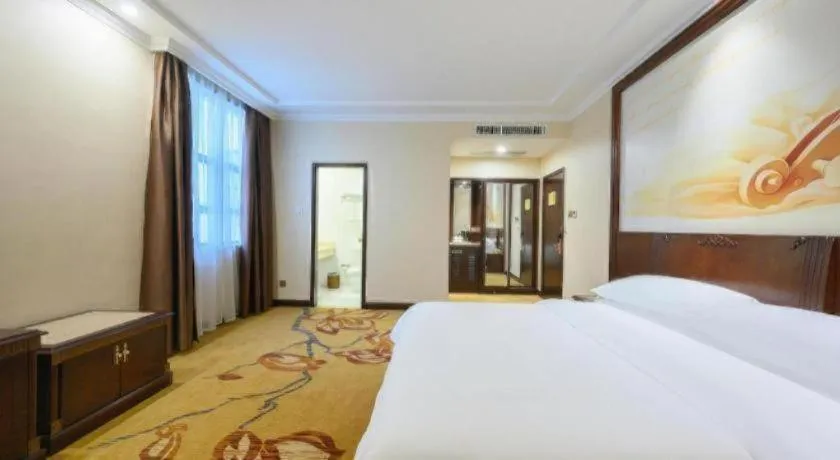 Bed in Vienna Classic Hotel Zhangzhou Longchi Center