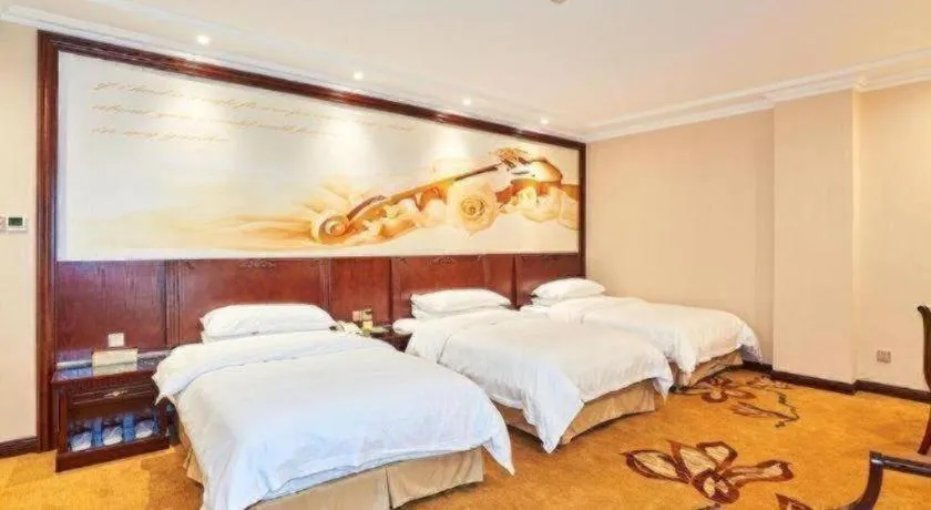 Bed in Vienna Classic Hotel Zhangzhou Longchi Center