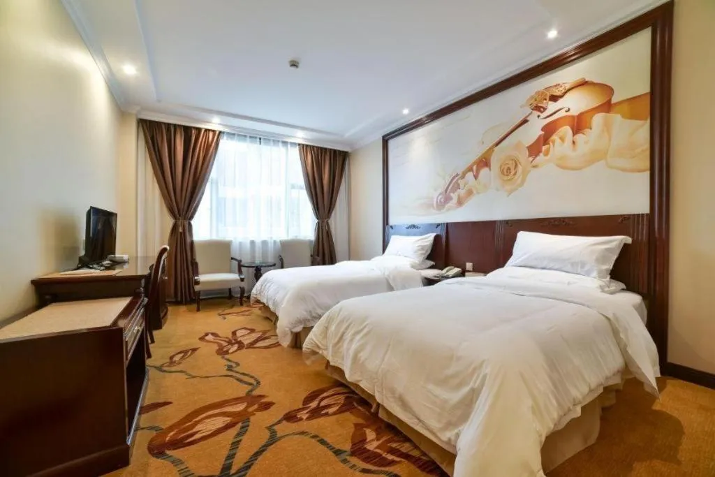 Bed in Vienna Classic Hotel Zhangzhou Longchi Center