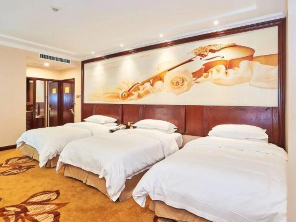 Bed in Vienna Classic Hotel Zhangzhou Longchi Center