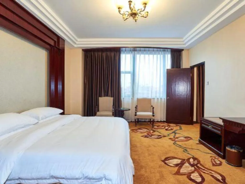 Bed in Vienna Classic Hotel Zhangzhou Longchi Center