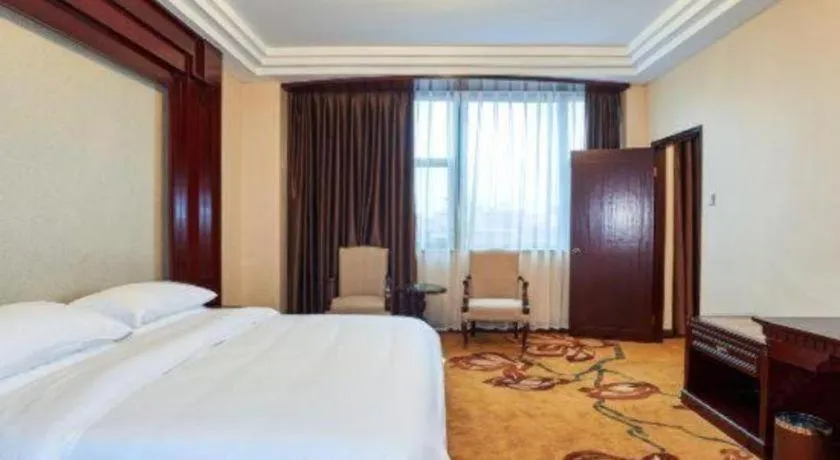 Bed in Vienna Classic Hotel Zhangzhou Longchi Center