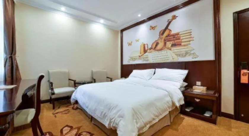 Bed in Vienna Classic Hotel Zhangzhou Longchi Center