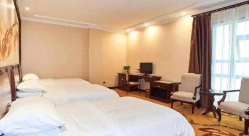 Bed in Vienna Classic Hotel Zhangzhou Longchi Center