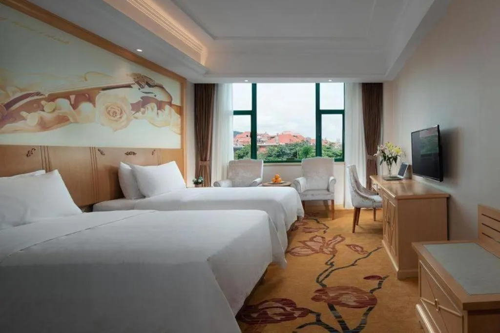 Bed in Vienna Classic Hotel Zhangzhou Longchi Center