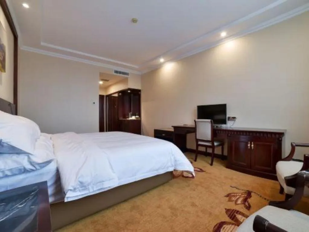 Bed in Vienna Classic Hotel Zhangzhou Longchi Center