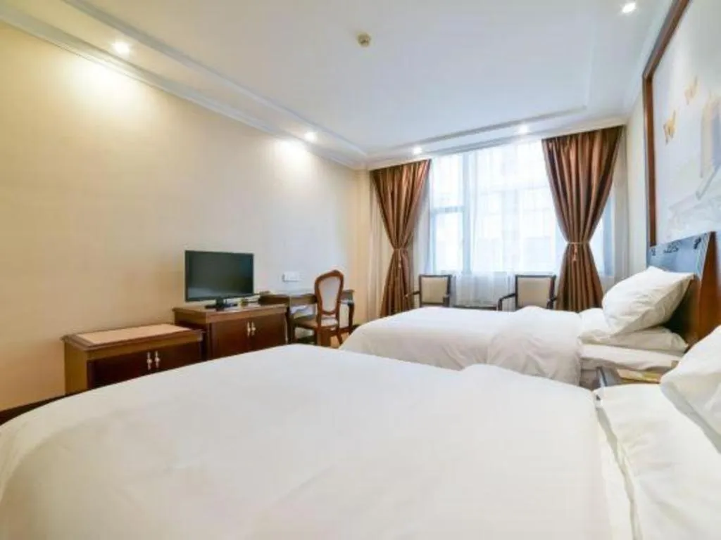 Bed in Vienna Classic Hotel Zhangzhou Longchi Center