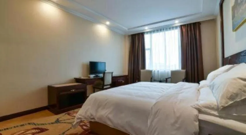 Bed in Vienna Classic Hotel Zhangzhou Longchi Center