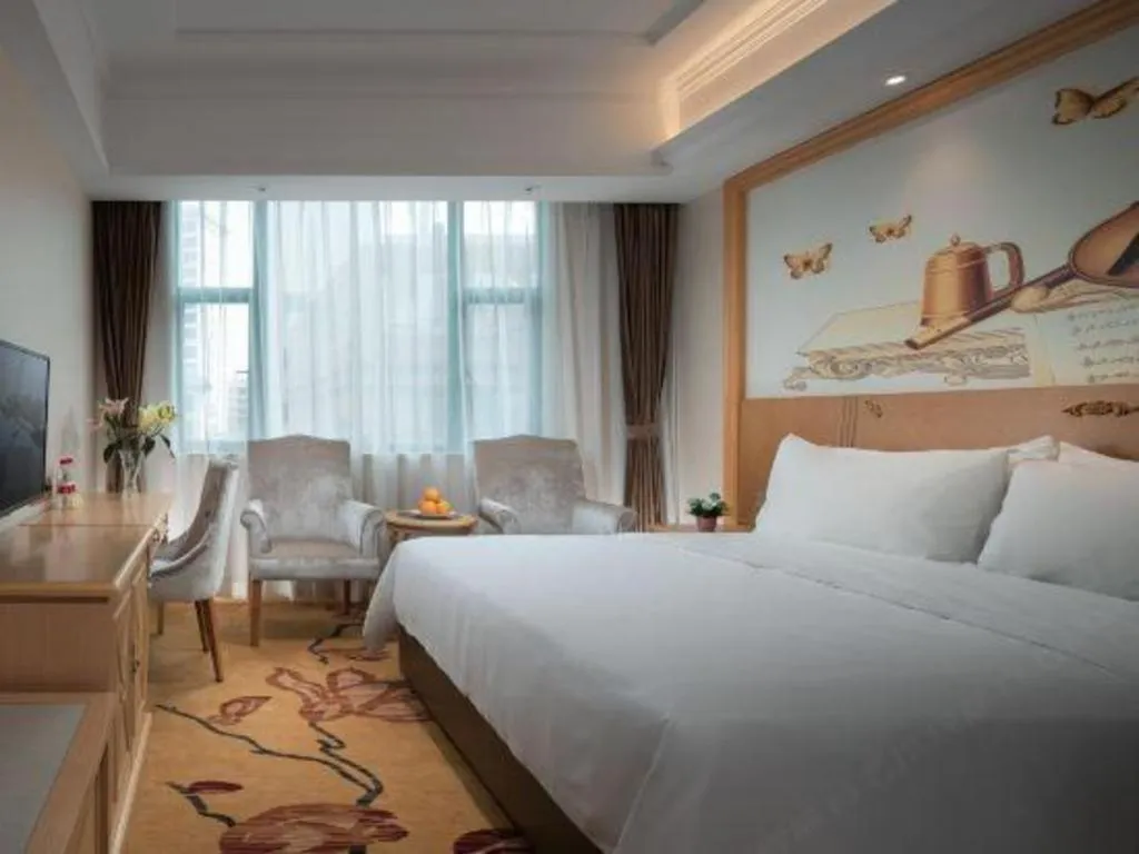 Bed in Vienna Classic Hotel Zhangzhou Longchi Center