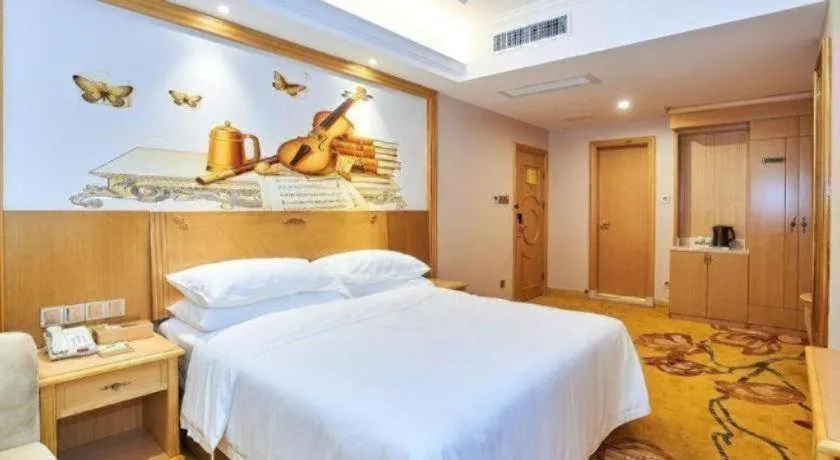 Bed in Vienna Classic Hotel Zhangzhou Longchi Center