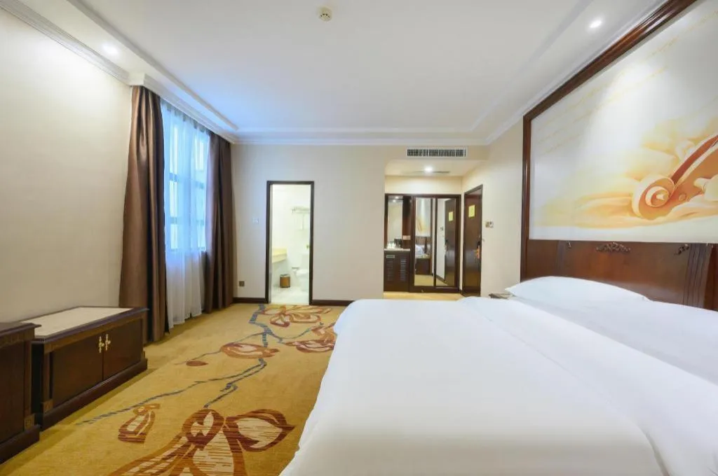 Bed in Vienna Classic Hotel Zhangzhou Longchi Center