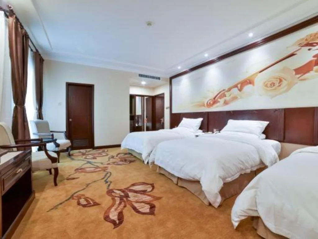 Bed in Vienna Classic Hotel Zhangzhou Longchi Center