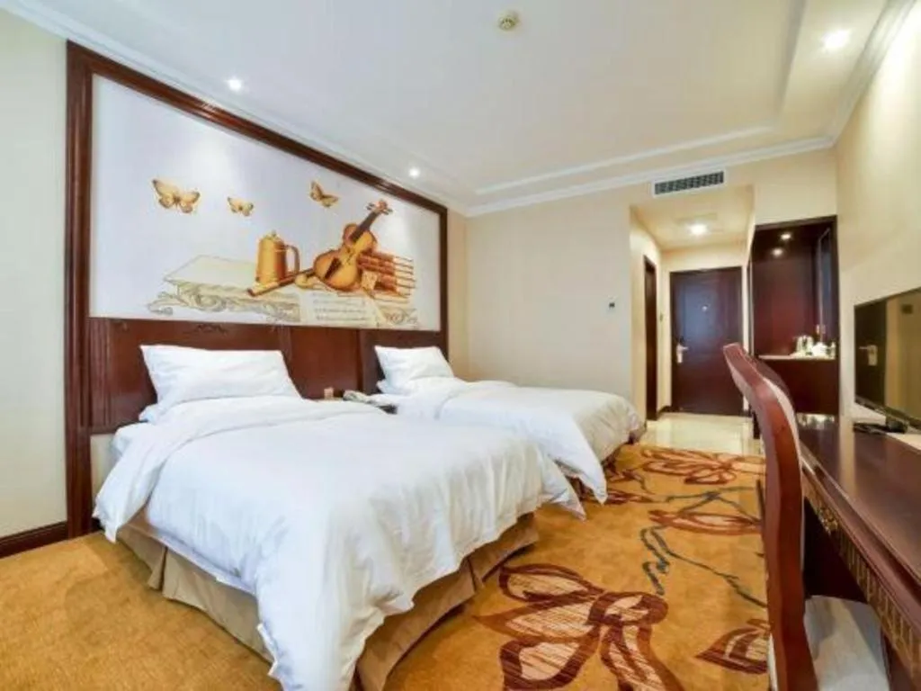 Bed in Vienna Classic Hotel Zhangzhou Longchi Center