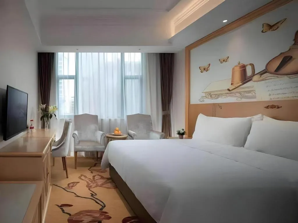 Bed in Vienna Classic Hotel Zhangzhou Longchi Center