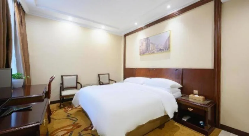 Bed in Vienna Classic Hotel Zhangzhou Longchi Center