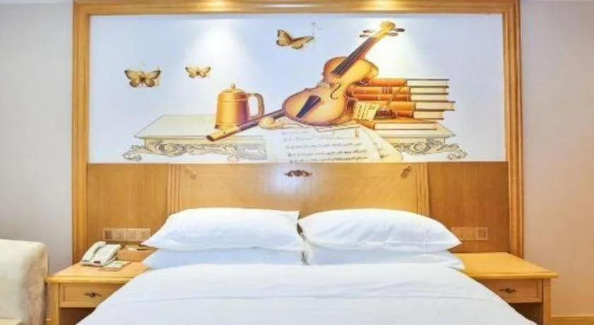 Bed in Vienna Classic Hotel Zhangzhou Longchi Center