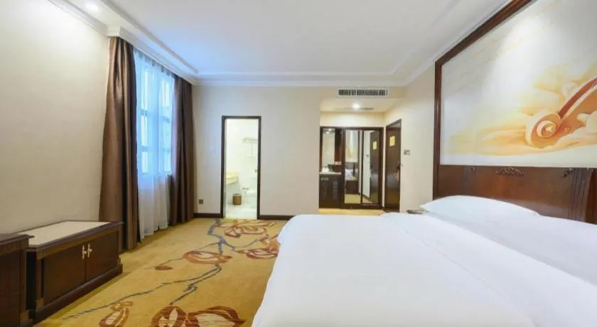 Bed in Vienna Classic Hotel Zhangzhou Longchi Center