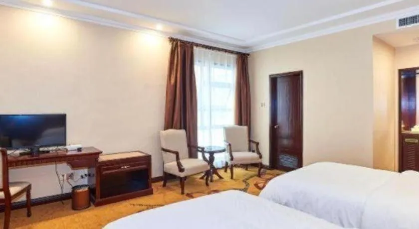 Bed in Vienna Classic Hotel Zhangzhou Longchi Center