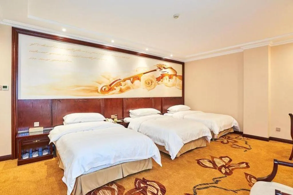 Bed in Vienna Classic Hotel Zhangzhou Longchi Center