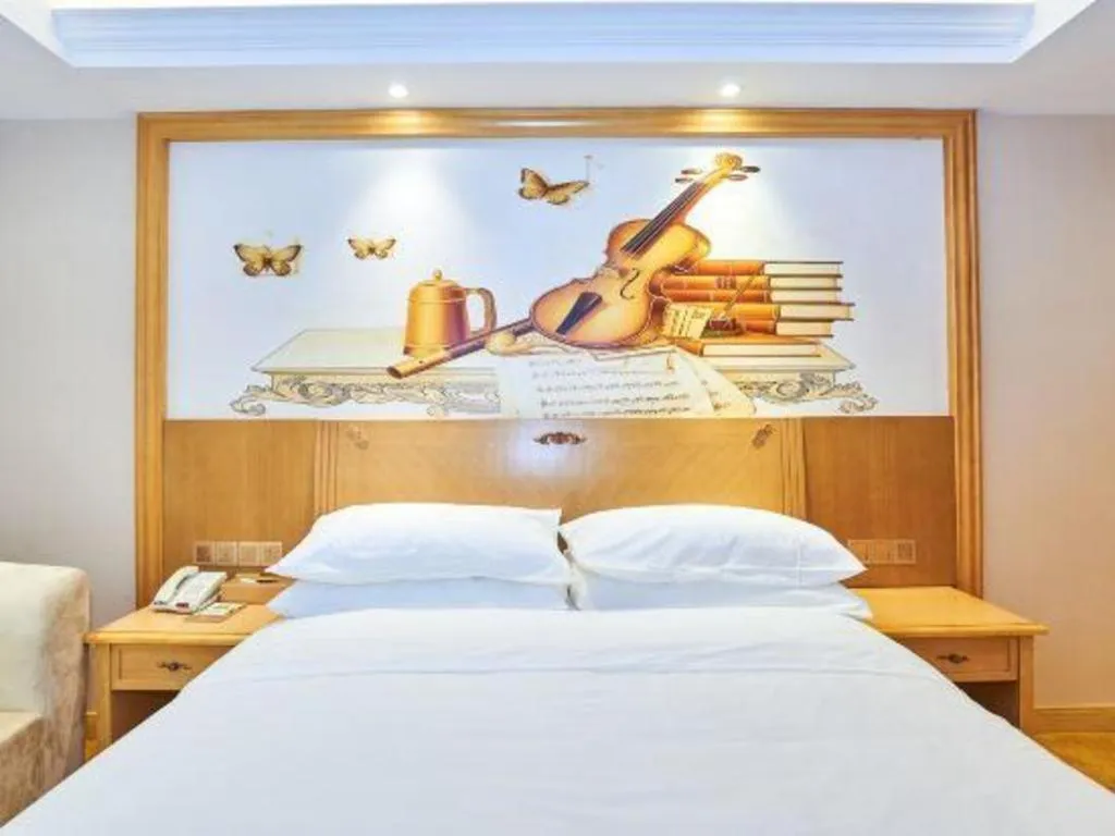 Bed in Vienna Classic Hotel Zhangzhou Longchi Center