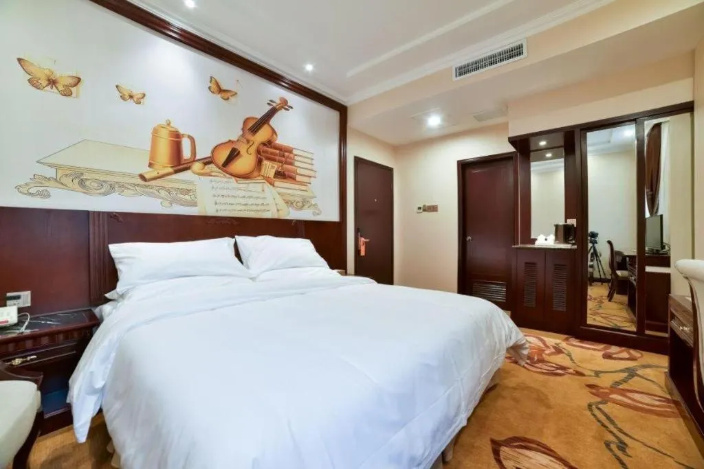 Bed in Vienna Classic Hotel Zhangzhou Longchi Center