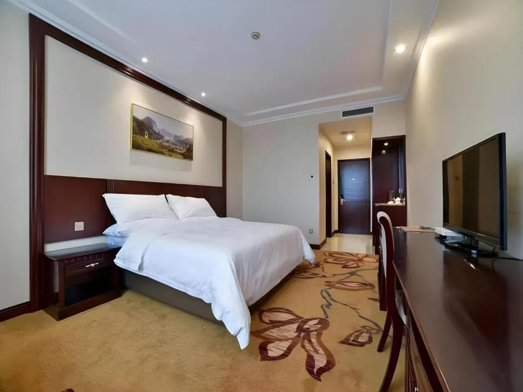 Bed in Vienna Classic Hotel Zhangzhou Longchi Center