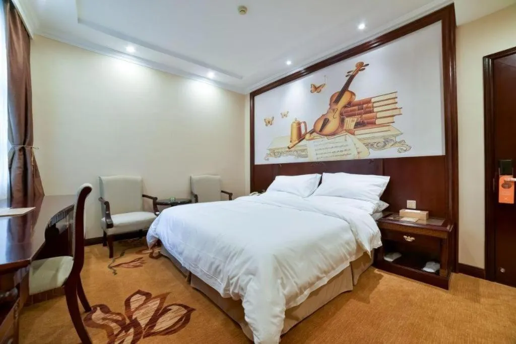 Bed in Vienna Classic Hotel Zhangzhou Longchi Center
