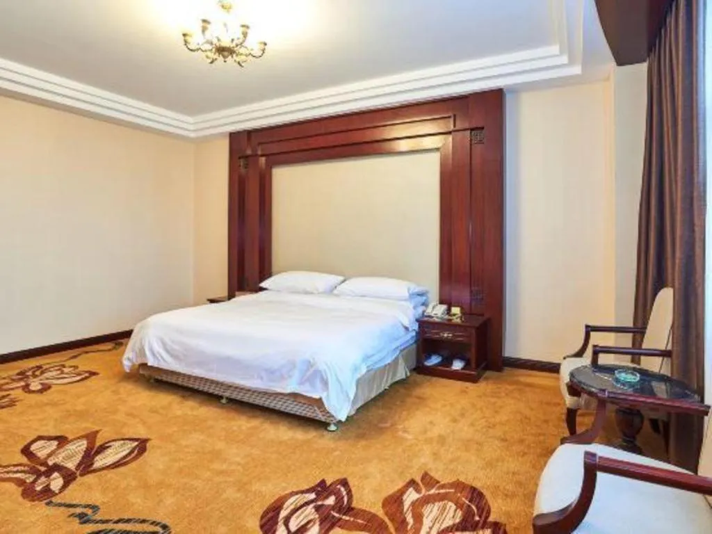 Bed in Vienna Classic Hotel Zhangzhou Longchi Center