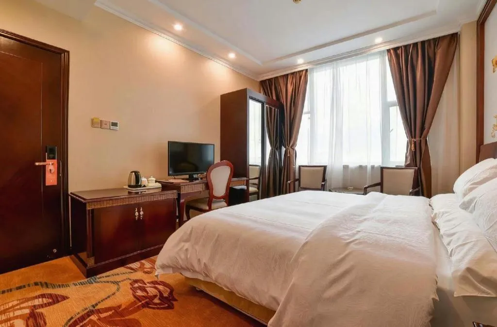 Bed in Vienna Classic Hotel Zhangzhou Longchi Center