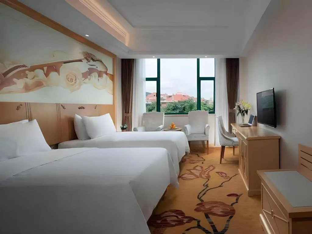 Bed in Vienna Classic Hotel Zhangzhou Longchi Center