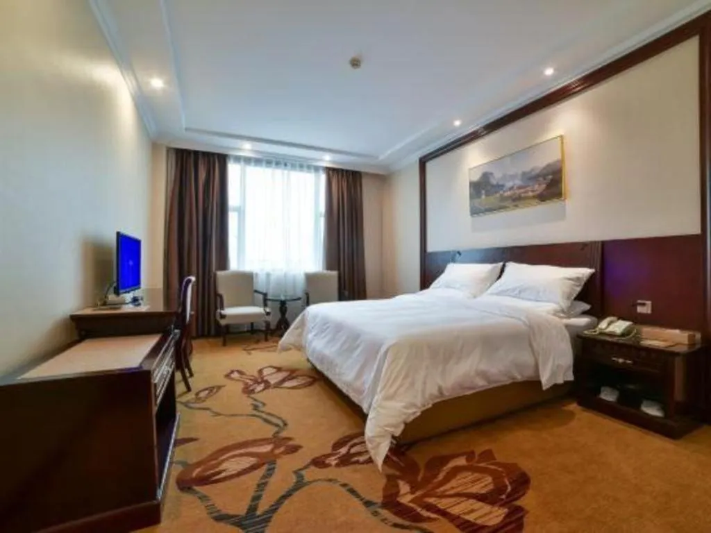 Bed in Vienna Classic Hotel Zhangzhou Longchi Center