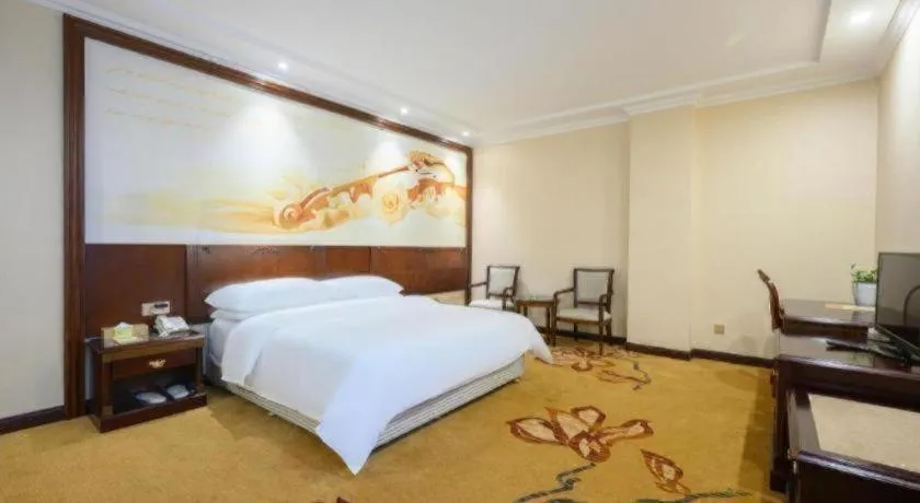 Bed in Vienna Classic Hotel Zhangzhou Longchi Center