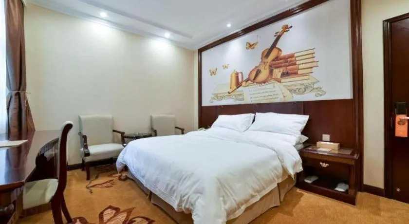 Bed in Vienna Classic Hotel Zhangzhou Longchi Center