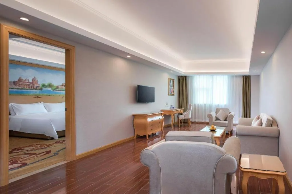 Bed in Vienna Hotel Guangdong Huizhou Lilin North Railway Station