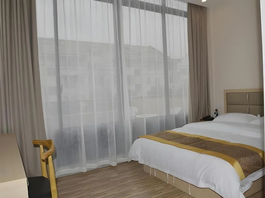 Bed in Shell Shanghai Jiading Nanxiang Town Minzhu Street Hotel
