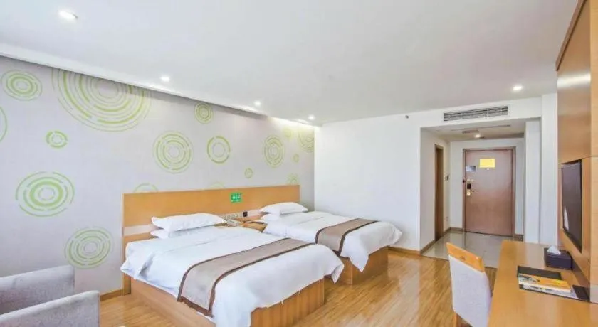 Bed in GreenTree Inn Tongxiang Chongfuzhen World Fur Center Branch