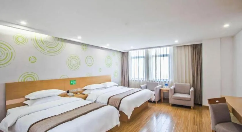 Bed in GreenTree Inn Tongxiang Chongfuzhen World Fur Center Branch