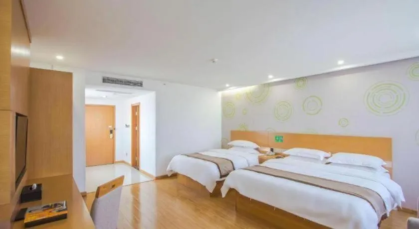 Bed in GreenTree Inn Tongxiang Chongfuzhen World Fur Center Branch