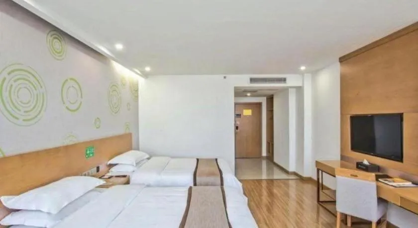 Bed in GreenTree Inn Tongxiang Chongfuzhen World Fur Center Branch