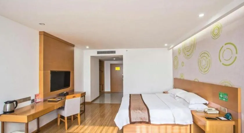 Bed in GreenTree Inn Tongxiang Chongfuzhen World Fur Center Branch