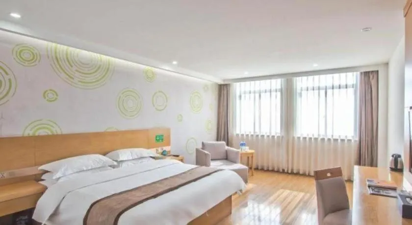 Bed in GreenTree Inn Tongxiang Chongfuzhen World Fur Center Branch