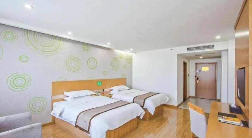 Bed in GreenTree Inn Tongxiang Chongfuzhen World Fur Center Branch