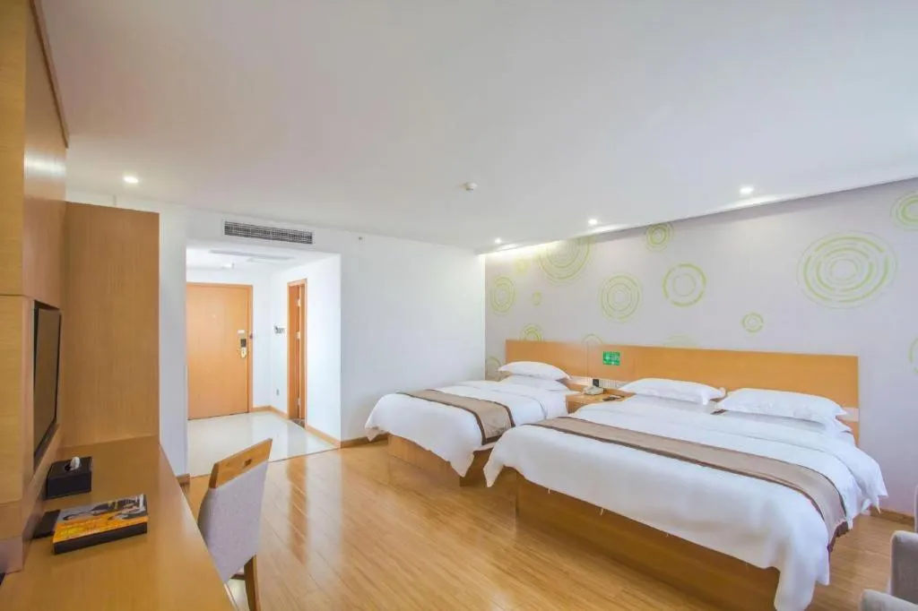 Bed in GreenTree Inn Tongxiang Chongfuzhen World Fur Center Branch